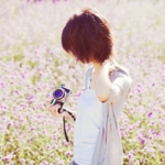 无泪的天使,唯美清新拿相机的女头图片