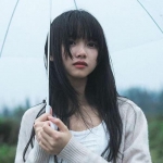 真人伤感打伞女头图片